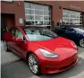  ?? AFP ?? Tesla said in July it delivered 200,000 electric cars to buyers in the US. —