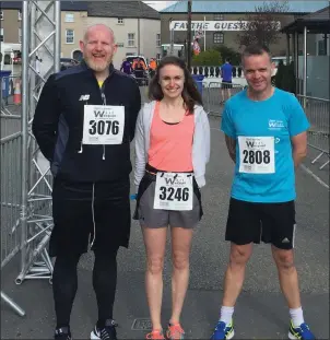  ??  ?? Our three leaders Dick Walsh, Anastasia Cash and Cormac McManus at the finish line on Sunday.
