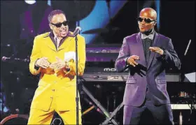  ?? COURTESY ?? Thomas Austin, right, who grew up watching his dad on Las Vegas stages, now dances alongside Morris Day as Jerome.