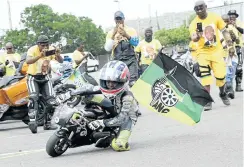  ?? Picture: Jackie Clausen ?? Politician­s didn’t get all the attention in Durban yesterday. Ten-year-old biker Oratilwe Phiri was also an attraction.