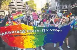  ??  ?? SYDNEY: This picture shows demonstrat­ors taking part in a same-sex marriage rally in Sydney.—AFP