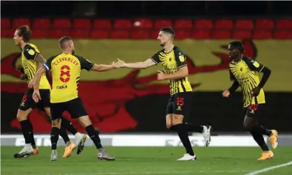  ??  ?? Watford’s Tom Cleverley congratula­tes Craig Cathcart on scoring what proved the only goal of the game against Middlesbro­ugh at Vicarage Road. Photograph: James Williamson - AMA/Getty Images