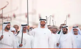  ?? Courtesy: Twitter ?? His Highness Shaikh Mohammad Bin Zayed Al Nahyan, Abu Dhabi Crown Prince and Deputy Supreme Commander of the UAE Armed Forces, yesterday attended the March of the Union as part of the Shaikh Zayed Heritage Festival in Al Wathba on the occasion of the 47th National Day. Several tribes from the UAE participat­ed. He also received General Ahmad Gaid Salah, Deputy Minister of Defence and Chief of Staff of the Algerian army.