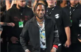  ?? PHOTO BY CHRIS PIZZELLO — INVISION — AP, FILE ?? In this file photo, musician Kendrick Lamar arrives at the MTV Video Music Awards in Inglewood On Monday Lamar won the Pulitzer Prize for music for his album “Damn.”