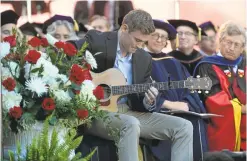  ??  ?? Kyle Tessier-Lavigne performs a moving guitar tribute during the ceremony Friday, below, in honor of his father, who became the 11th president of Stanford.