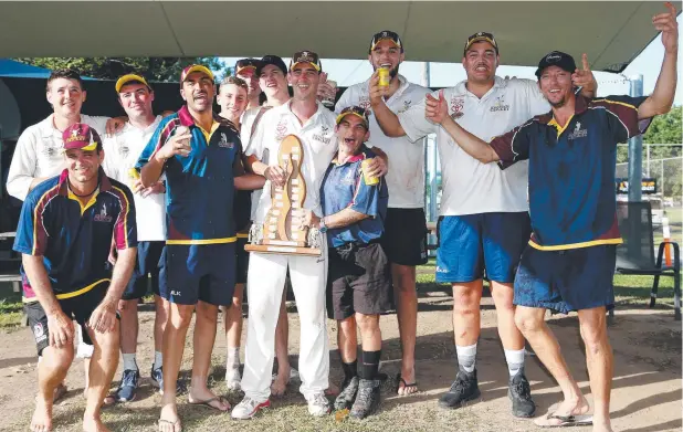  ?? Picture: STEWART McCLEAN ?? PREMIERS: Atherton celebrates its win with skipper Tommy Boorman (with trophy) flanked by Michael Salerno and Anthony Murio.