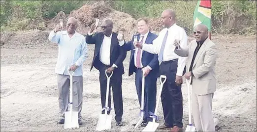  ??  ?? Mike Elliott (centre) at a sod turning for the hotel at Ogle in February of this year. From left are: former Minister of Finance Winston Jordan, former acting Head of NICIL Colvin Health-London, Eliott, Edmon Braithwait­e and another representa­tive.