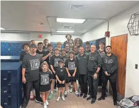  ?? PROVIDED PHOTO ?? The Jupiter boys basketball team poses together for a celebrator­y photo in the locker rooms of Dwyer High School after defeating the defending 6A state champions, 49-48, on Jan. 20.