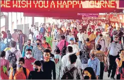  ??  ?? A large crowd of commuters seen at Dadar station on Tuesday, Day 2 after suburban train services resumed for all citizens, following a 10-month restrictio­n owing to the pandemic.
