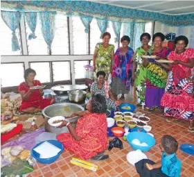  ?? Photo: Peni Komaisavai ?? Women and mothers of Naseyani Primary School serving food for their guests during the opening of their new dining hall in Ra, on June 12, 2018.