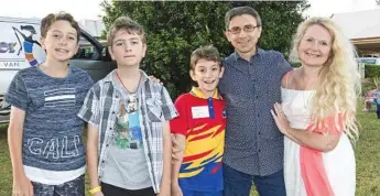  ??  ?? Enjoying the hospice’s Christmas carols are (from left) William Hills, Christian, Camillo, dad Camillo and Christine Lanzafame.