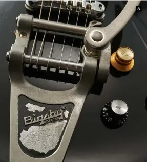  ??  ?? 6 7. Hiding under the dog‑ear cover is Bare Knuckle’s Boot Camp Old Guard P90. The bridge, with its pre‑set intonation ridge, “is made from our lightweigh­t alloy designed to have your guitar bursting with harmonics”, says Graph Tech. It also magnetical­ly locks to the posts