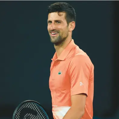  ?? GRAHAM DENHOLM/GETTY ?? Novak Djokovic returns to the Australian Open after being unable to compete last year because he was not vaccinated against COVID-19.
