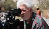  ?? ?? Top to bottom: Ethan Hawke and Pedro Pascal as Jake and Silva; A tender moment between the lovers; Director Pedro Almodóvar behind the lens.