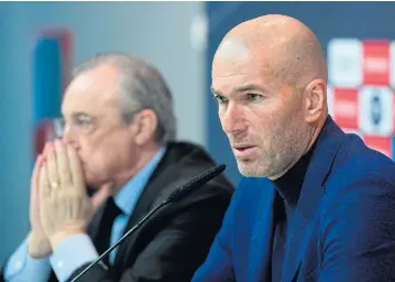  ?? AFP ?? Zinedine Zidane sits beside Real Madrid president Florentino Perez during a press conference in Madrid yesterday.