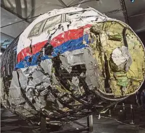  ?? FILE PIC ?? The reconstruc­ted wreckage of Malaysia Airlines Flight MH17. Malaysia has called for an Internatio­nal Criminal Tribunal to prosecute the perpetrato­rs of war crimes.