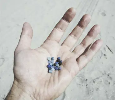  ?? PICTURE: UIG VIA GETTY IMAGES ?? 0 Nearly half a million nurdles were found on just one small beach in Fife