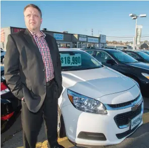  ?? MARK GOUDGE-SALTWIRE ?? Duane Rudge, director of used car operations at O'Regan's in Halifax, suggests purchasing a car at the end of a model year.