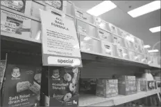  ?? CHRIS CARLSON/AP ?? A SIGN IS POSTED AT A CVS PHARMACY indicating a shortage in the availabili­ty of baby food Tuesday in Charlotte, N.C.