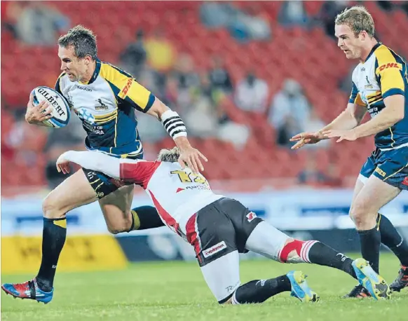  ??  ?? The Brumbies’ Andrew Smith at full stretch and, inset, coach Jake White.