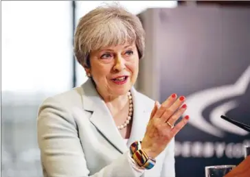  ?? CHRISTOPHE­R FURLONG/GETTY IMAGES/AFP ?? Britain’s Prime Minister Theresa May delivers a speech on education at Derby College in Derby, northern England on February 19.