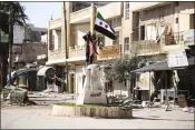  ?? GHAITH ALSAYED — THE ASSOCIATED PRESS ?? Turkish-backed Syrian rebels enter the town of Saraqeb, in Idlib province, Syria, Thursday.