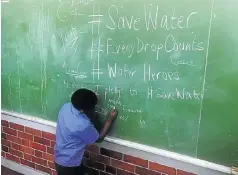  ??  ?? A boy participat­es in a water education programme rolled out in the Western Cape.