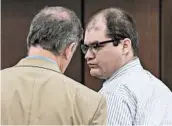  ?? TRACY GLANTZ/AP ?? Defense attorney Boyd Young talks with Timothy Jones Jr., right, during sentencing in Lexington, S.C.