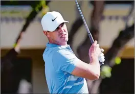  ?? RICK SCUTERI/AP PHOTO ?? Brooks Koepka tees off on the fifth hole during the final round of the Phoenix Open on Sunday in Scottsdale, Ariz.