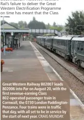  ?? CRAIG MUNDAY. ?? Great Western Railway 802007 leads 802006 into Par on August 20, with the first revenue-earning Class 802-operated passenger train in Cornwall, the 0730 London Paddington­Penzance. Four trains were in traffic that day, with all set to be in service by the start of next year.