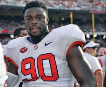  ?? RICHARD SHIRO — THE ASSOCIATED PRESS FILE ?? Clemson coach Dabo Swinney says he is ‘very optimistic’ All-American Shaq Lawson will play in the national title game against Alabama after the defensive end missed most of the Tigers’ semifinal victory with a knee injury.