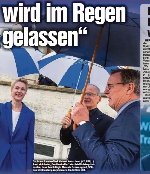  ?? ?? Sachsens Landes-Chef Michael Kretschmer (47, CDU, l.) freut sich beim „Familientr­effen“der Ost-Ministerpr­äsidenten, dass ihm Kollegin Manuela Schwesig (48, SPD) aus Mecklenbur­g-Vorpommern den Schirm hält.