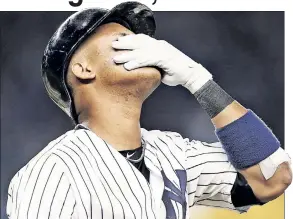  ?? Robert Sabo;Getty Images ?? BLOWN AWAY: Adam Warren reacts after allowing the go-ahead two-run home run in a 6-2 loss to the Royals, as Starlin Castro (inset) and the offense was unable to make up the deficit.