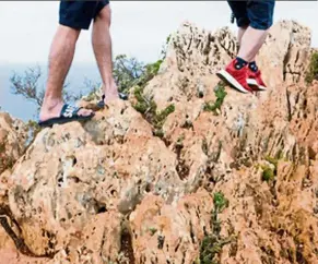  ??  ?? are slides and slippers the right kind of footwear for a dangerous trek like this? — dpa