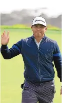  ?? ERIC RISBERG/ASSOCIATED PRESS ?? Kurt Kitayama waves after making a birdie putt Friday during the AT&T Pebble Beach Pro-Am golf tournament’s second round.