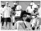 ?? CHARLES KING/STAFF PHOTOGRAPH­ER ?? UCF coaches and support staff had to join players getting into shape to help execute new coach Scott Frost’s plan.