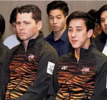  ?? — YAP CHEE HONG / The Star ?? Creating history: National figure skater Julian Yee (right) and coach Michael Hopfes at the flag-handing ceremony at a hotel in Kuala Lumpur yesterday.