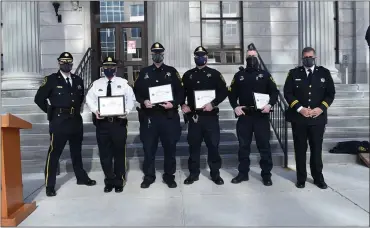  ?? PHOTO COURTESY OF MONTGOMERY COUNTY SHERIFF’S DEPARTMENT ?? Montgomery County Sheriff’s Office Chief Adam Berry (left) and Sheriff Sean Kilkenny (right) flank, from left, Lt. Joanne Lawlor, Cpl. Matthew Pokorny, Cpl. Tim Metz and Sgt. Ronald Cole who received Patriot Awards from Employer Support of the Guard and Reserve.