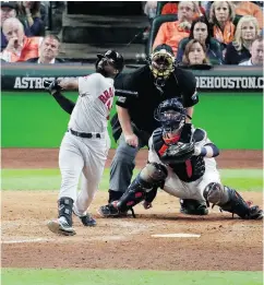  ?? LYNNE SLADKY / THE ASSOCIATED PRESS ?? Boston’s Jackie Bradley Jr. smacks his grand slam off Houston relief pitcher Roberto Osuna on Tuesday.