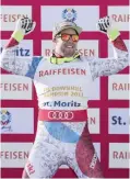  ??  ?? ST MORITZ: Beat Feuz of Switzerlan­d, winner, reacts during the men’s downhill winner presentati­on at the 2017 FIS Alpine Skiing World Championsh­ips in St Moritz, Switzerlan­d, yesterday. —AP