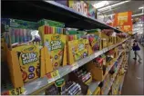  ?? GENE J. PUSKAR — THE ASSOCIATED PRESS FILE ?? Environmen­tally friendly school supplies often carry big prices, but if you expand your idea of what counts as “green,” you’ll open other ways to save.