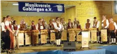  ?? Fotos: Helmut Gensberger ?? Ein Konzert gab der Musikverei­n Gablingen unter der Leitung von Martin Scham per.