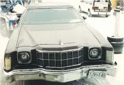  ??  ?? A 1976 Ford Elite Torino was seized in the investigat­ion.