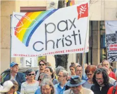  ?? FOTO: RALPH PETERS/IMAGO ?? Katholisch­e Friedensbe­wegungen wie „Pax Christi“werden sich beim Katholiken­tag in Stuttgart zu Wort melden.