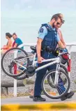  ?? Photo / Paul Taylor ?? Two young police constables, both trained lifesavers, tried to reach the boy who was snatched by a wave.