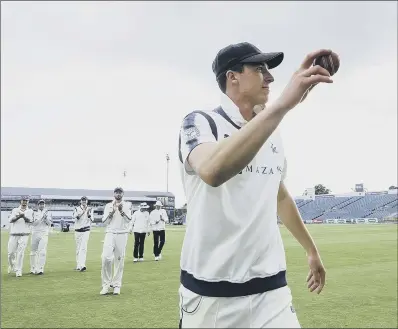  ?? PICTURE: SWPIX.COM ?? CATCH OF THE DAY: Yorkshire’s Matthew Fisher is applauded after taking five wickets in the innings against Warwickshi­re.