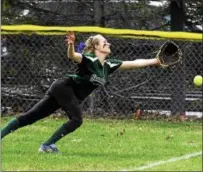  ??  ?? Shenendeho­wa left fielder Brandi Markowski dives for a tailing shot from a Massapequa’s Julia Ruocchiio the third inning of Saturday’s second Forever Missed Softball Tournament doublehead­er at the Clifton Common.