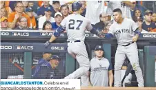  ??  ?? GIANCARLO STANTON. Celebra en el banquillo después de un jonrón./Fotos:AP