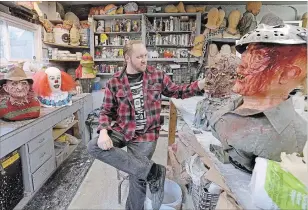  ?? PHOTOGRAPH­Y BY CATHIE COWARD, THE HAMILTON SPECTATOR ?? It's a busy time of year for horror mask maker Steve Bellamy, seen here in his workshop surrounded by some of his favourite creations.