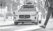  ??  ?? A Waymo One vehicle